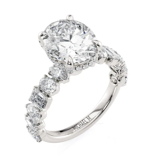 Oval Mounting With Emerald, Oval, Pear, and Marquis Band