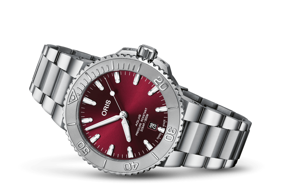 Aquis Date Cherry Edition Relief Bezel
